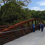 A long stout truss bridge greets visitors at the park entrance.